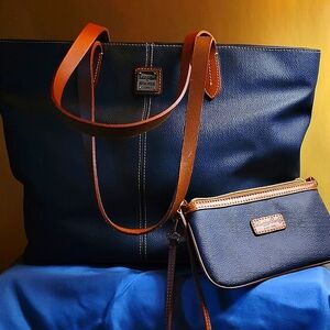 Dooney and Burke pebble leather band with matching wristlet